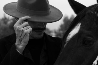 mysterious cowboy and horse in monochrome