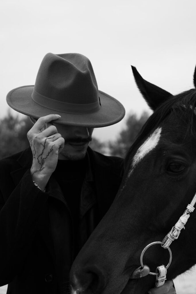 mysterious cowboy and horse in monochrome